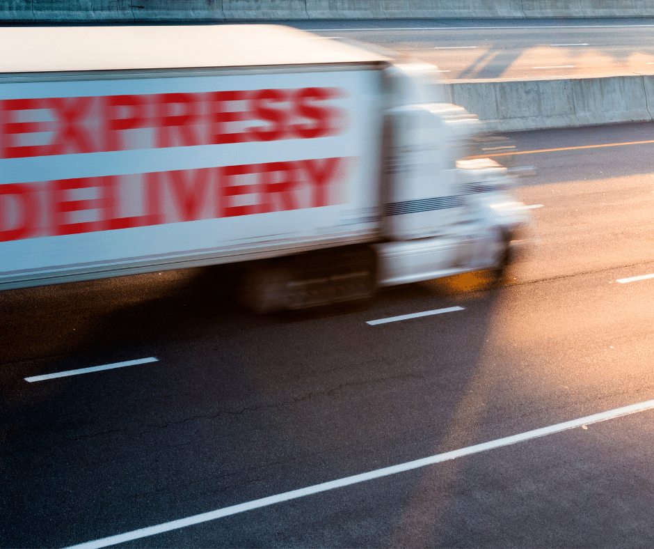 An FBA Express semi truck driving down a highway